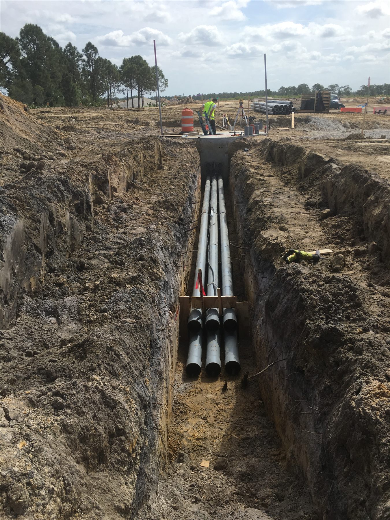 Parallel underground conduits placed in a Charlotte County development corridor